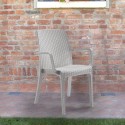 Stock 18 sillas de rattan apilables con reposabrazos para jardín exterior Indiana Bica Precio