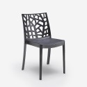 Juego de jardín con 1 mesa efecto ratán de 150x90 cm y 6 sillas de exterior color negro Meloria Dark 