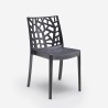 Juego de jardín con 1 mesa efecto ratán de 150x90 cm y 6 sillas de exterior color negro Meloria Dark 