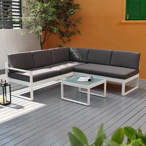 Conjunto de jardín esquiero de exterior con sofá + mesa de cristal Jamila Promoción
