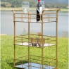 Carrito de bar rectangular dorado con estantes de vidrio espejado Glammy Venta