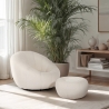 Sillón giratorio de diseño de tela bouclé blanco con puf reposapiés Kuma Venta