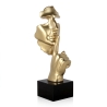 Escultura surrealista en resina efecto metal rostro masculino Lira-M Descueto