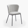 Silla de salón-comedor de diseño moderno de tela con patas negras Lasta Características