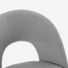 Silla elegante tapizada en tela para salón comedor Sarwa Stock