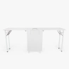 Mesa de esteticista y manicura compacta con doble mesa y ruedas Dabol Catálogo