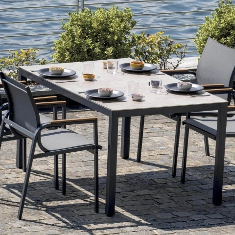 Set de exterior con mesa de vidrio y 4 sillas Tarquinia Promoción