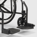 Silla de ruedas plegable en tejido ortopédico con frenos discapacitados y ancianos Dasy 