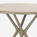 Juego mesa redonda 80 cm beige 2 sillas polipropileno diseño Fisher Coste